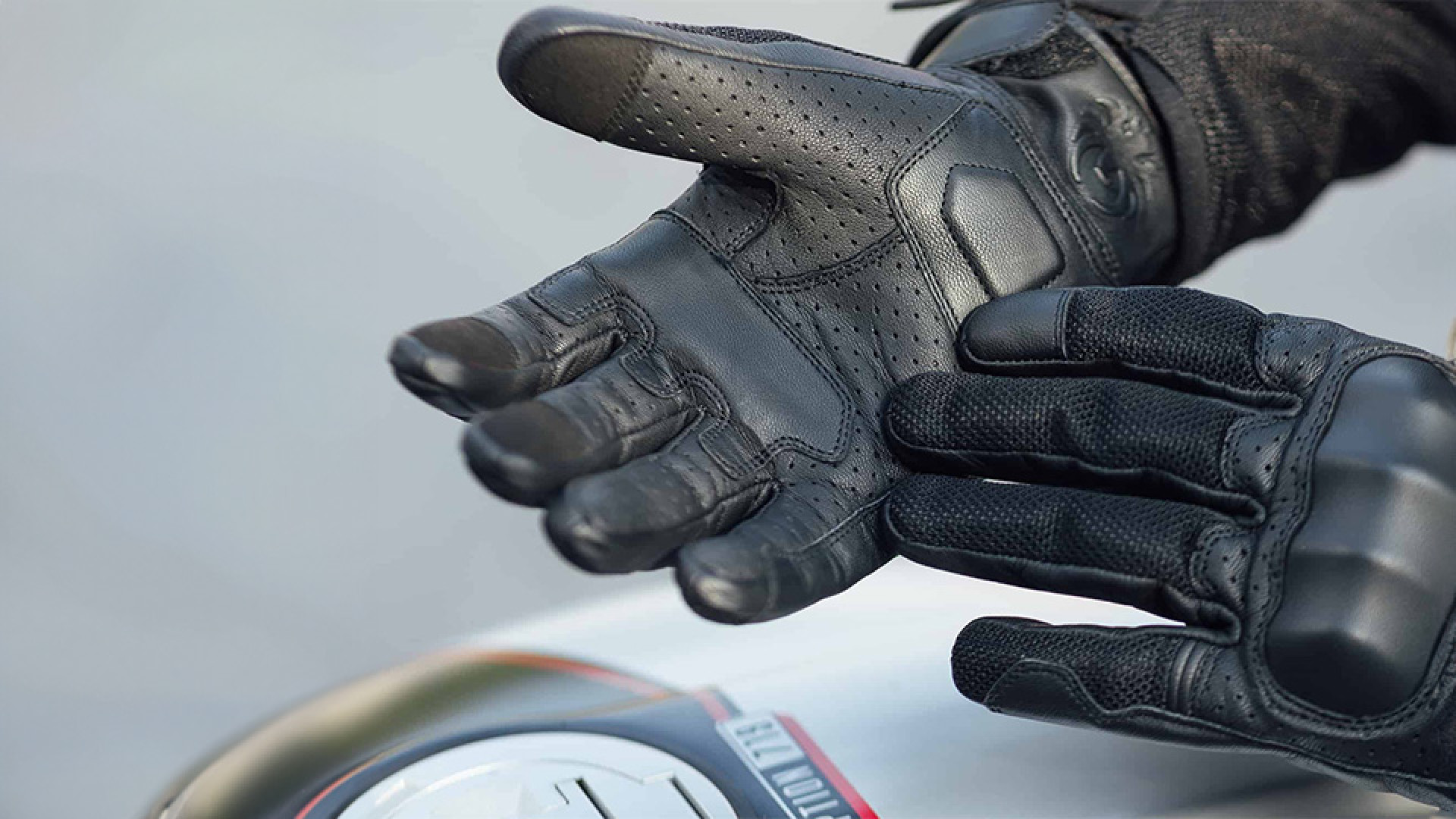 https://www.raceleathers.co.uk/image/cache/catalog/Blog%20Images/Should%20Motorcycle%20Gloves%20Be%20Tight%20or%20Loose-1920x1080.jpg
