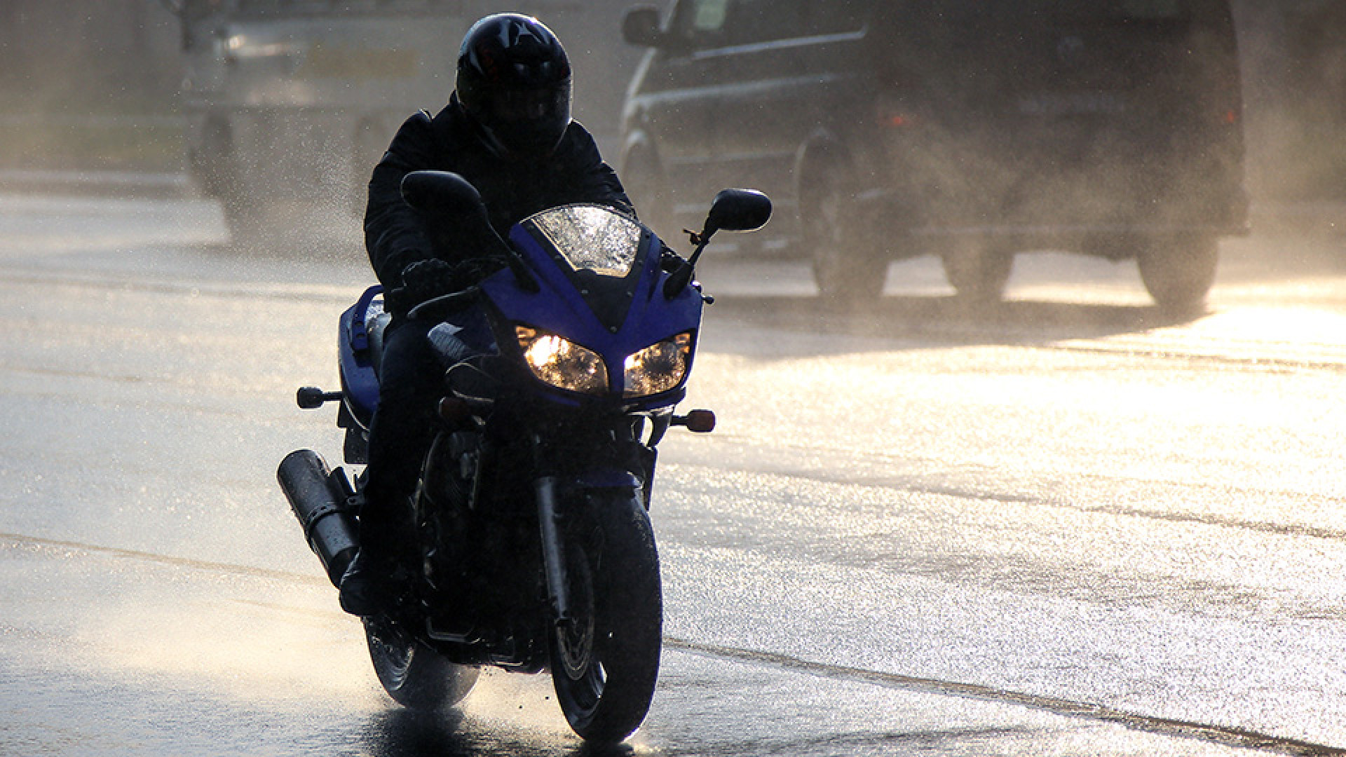 https://www.raceleathers.co.uk/image/cache/catalog/Blog%20Images/Tips%20for%20Riding%20a%20Motorcycle%20in%20the%20Rain-1920x1080.jpg